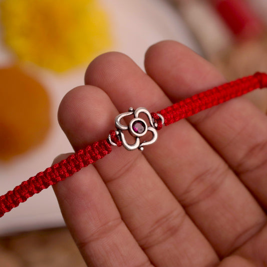 Enchanting Ruby Silver Rakhi