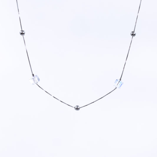 Glimmering Charms: Silver Chain Necklace with Crystal Charms and Petite Silver Beads